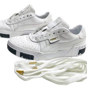 Puma Shoes: White with gold logo and shoe strings. Original box not available.